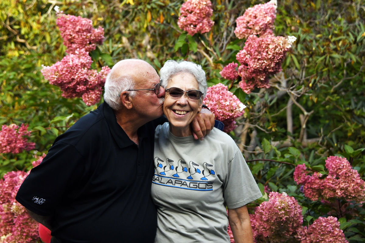 068 Adam Broughton sneaks a kiss at the Heritage Garden.jpg